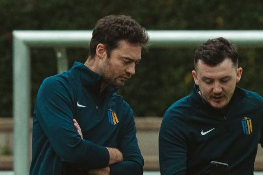 Reviewing footage on the training ground